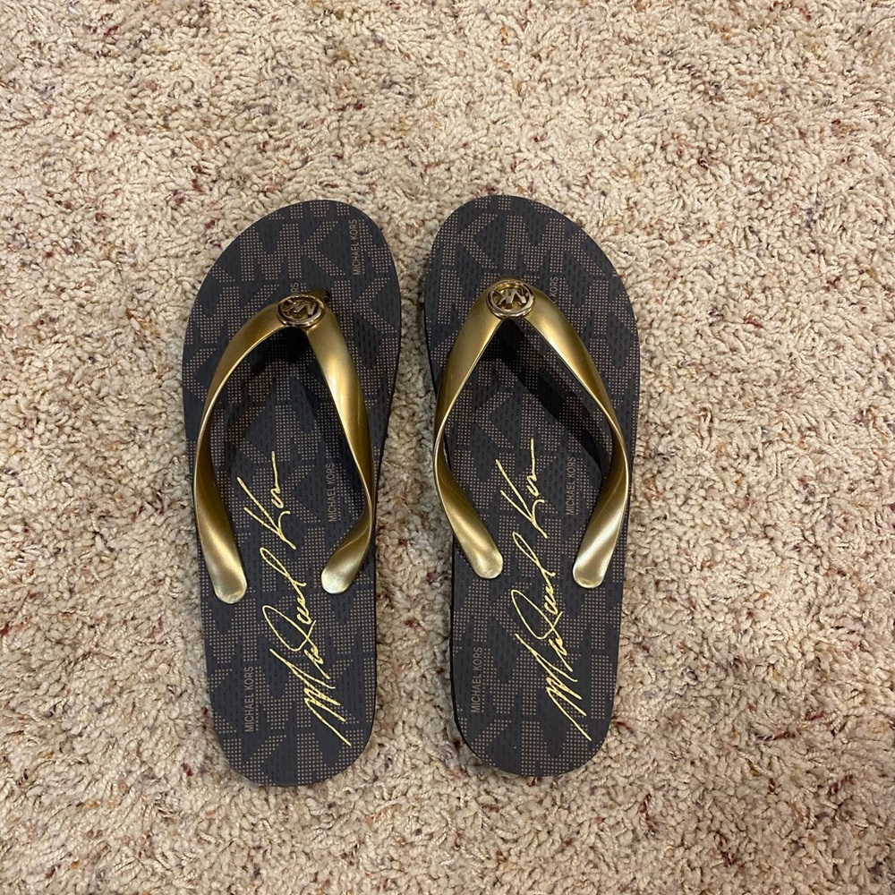 Micheal Kors flip flops